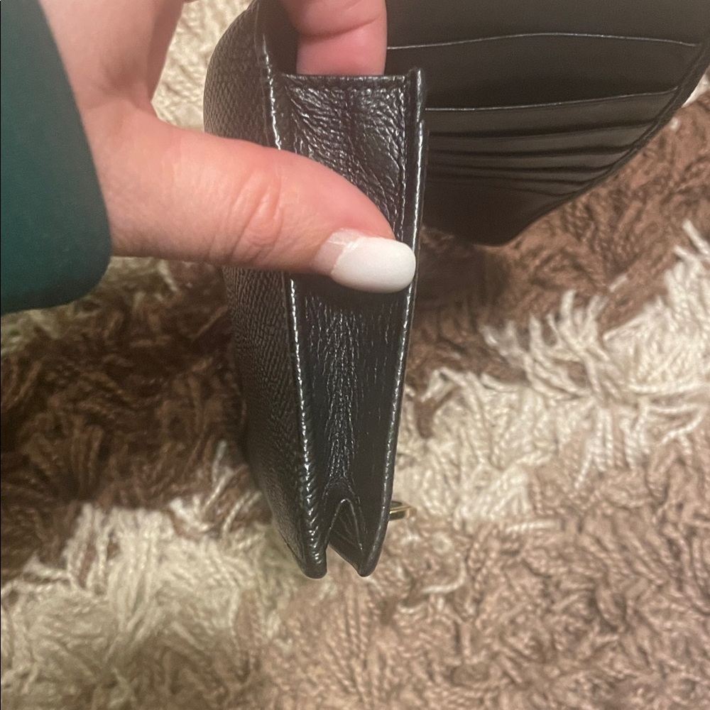 Bulgari Black Wallet with Gold Ring Detail - Picture 14 of 14